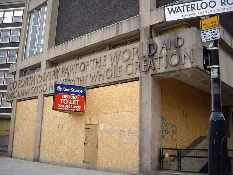 Building near Waterloo Road with inscription about proclaiming good news to the world